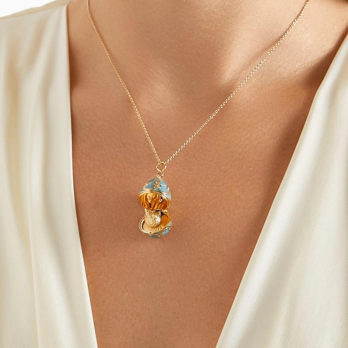 FABERGE- Heritage 18K Yellow Gold with Turquoise Guilloche Enamel and Hen surprise 1442/119 FABERGE- Heritage 18K Yellow Gold with Turquoise Guilloche Enamel and Hen surprise 1442/119
